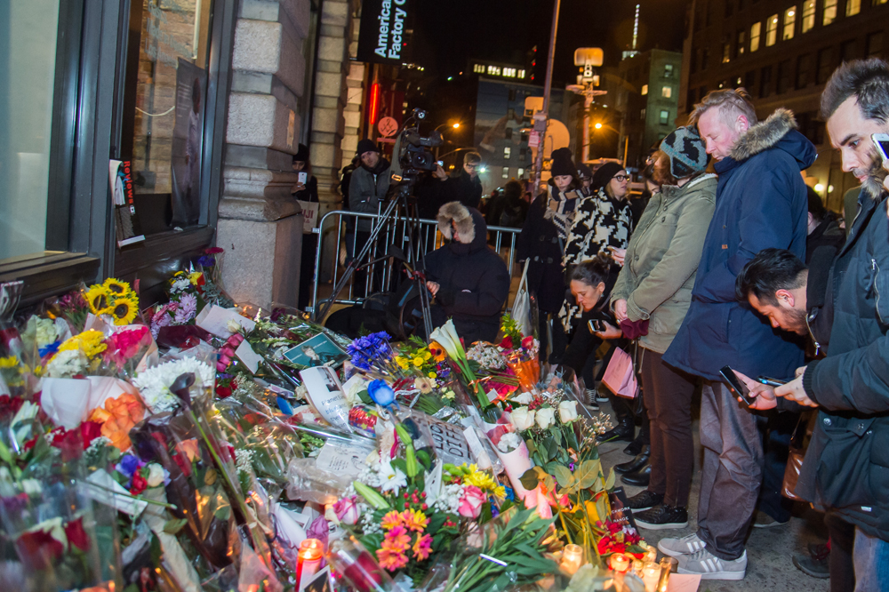 NEW YORK, NY - JANUARY 11: David Bowie is remembered by fans who gathered outside his home in SoHo on January 11, 2016 in New York, United States. Bowie passed away at on Sunday, January 10th at the age on 69 after an 18 month battle with cancer. Mark Sagliocco/Getty Images/AFP