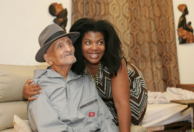 Andrew Hatch of Oakland, who celebrated his 116th birthday on Tuesday, poses for a picture with his daughter Delane Sims, 53, on Tuesday Oct. 7, 2014. (Doug Oakley/Bay Area News Group)