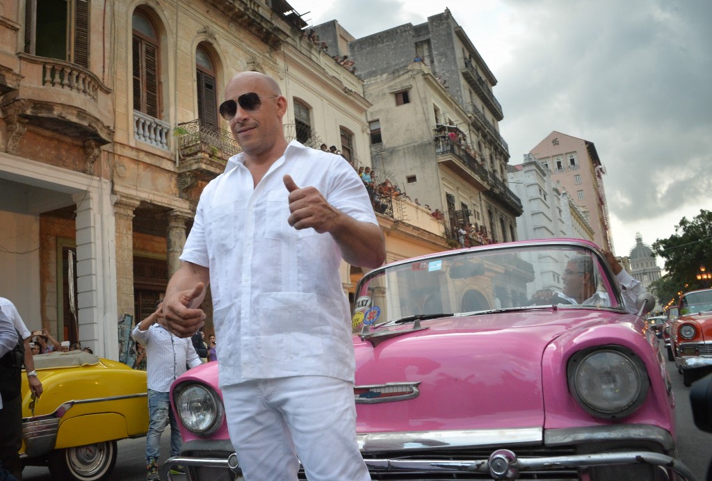 US actor Vin Diesel arrivesat the Prado promenade in Havana, on May 3, 2016 to watch the Chanel performance. / AFP PHOTO / ADALBERTO ROQUE