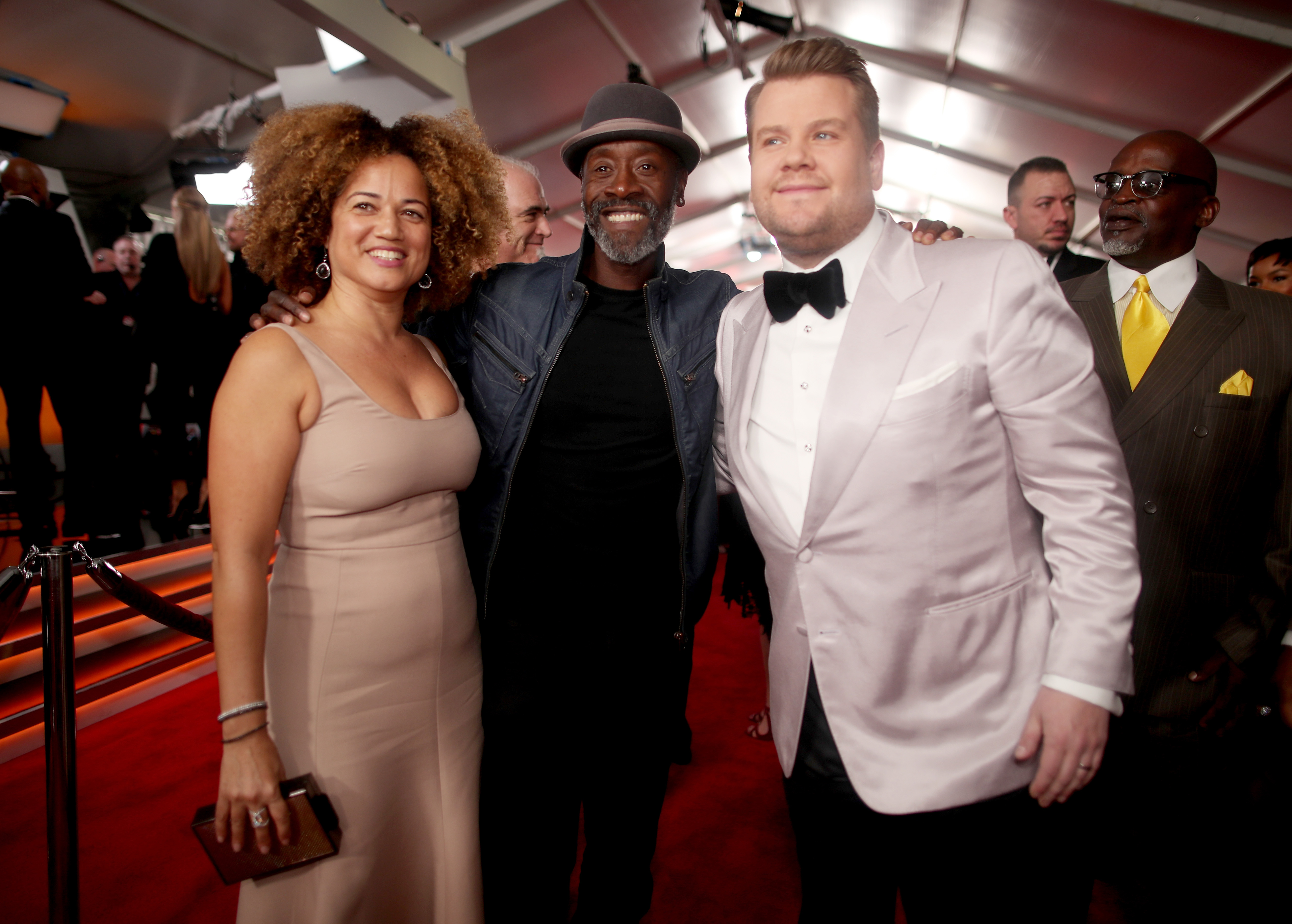 LOS ANGELES, CA - FEBRUARY 12: (L-R) Actors Bridgid Coulter and Don Cheadle and host James Corden attend The 59th GRAMMY Awards at STAPLES Center on February 12, 2017 in Los Angeles, California.   Christopher Polk/Getty Images for NARAS/AFP