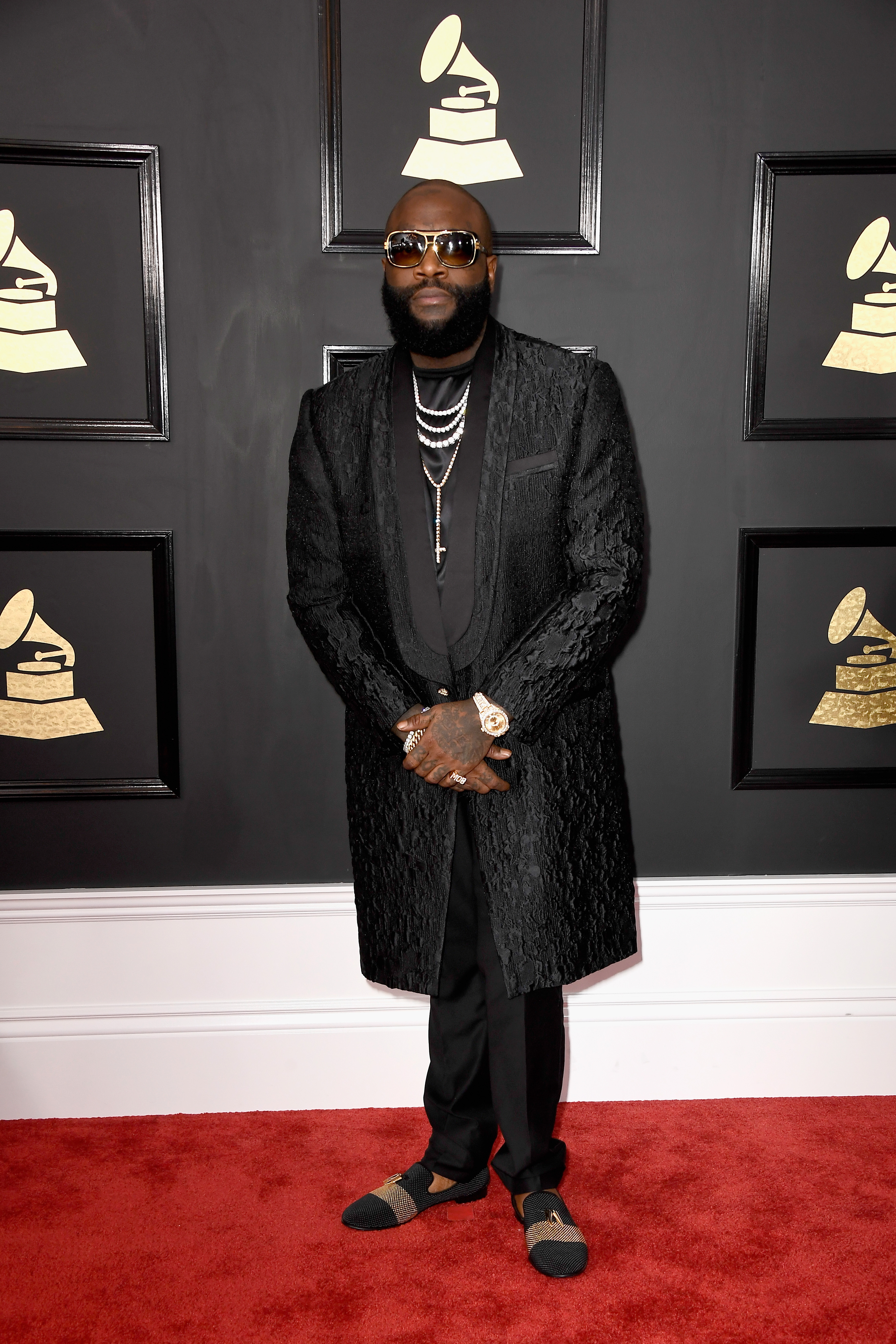 LOS ANGELES, CA - FEBRUARY 12: Rapper Rick Ross attends The 59th GRAMMY Awards at STAPLES Center on February 12, 2017 in Los Angeles, California. Frazer Harrison/Getty Images/AFP
