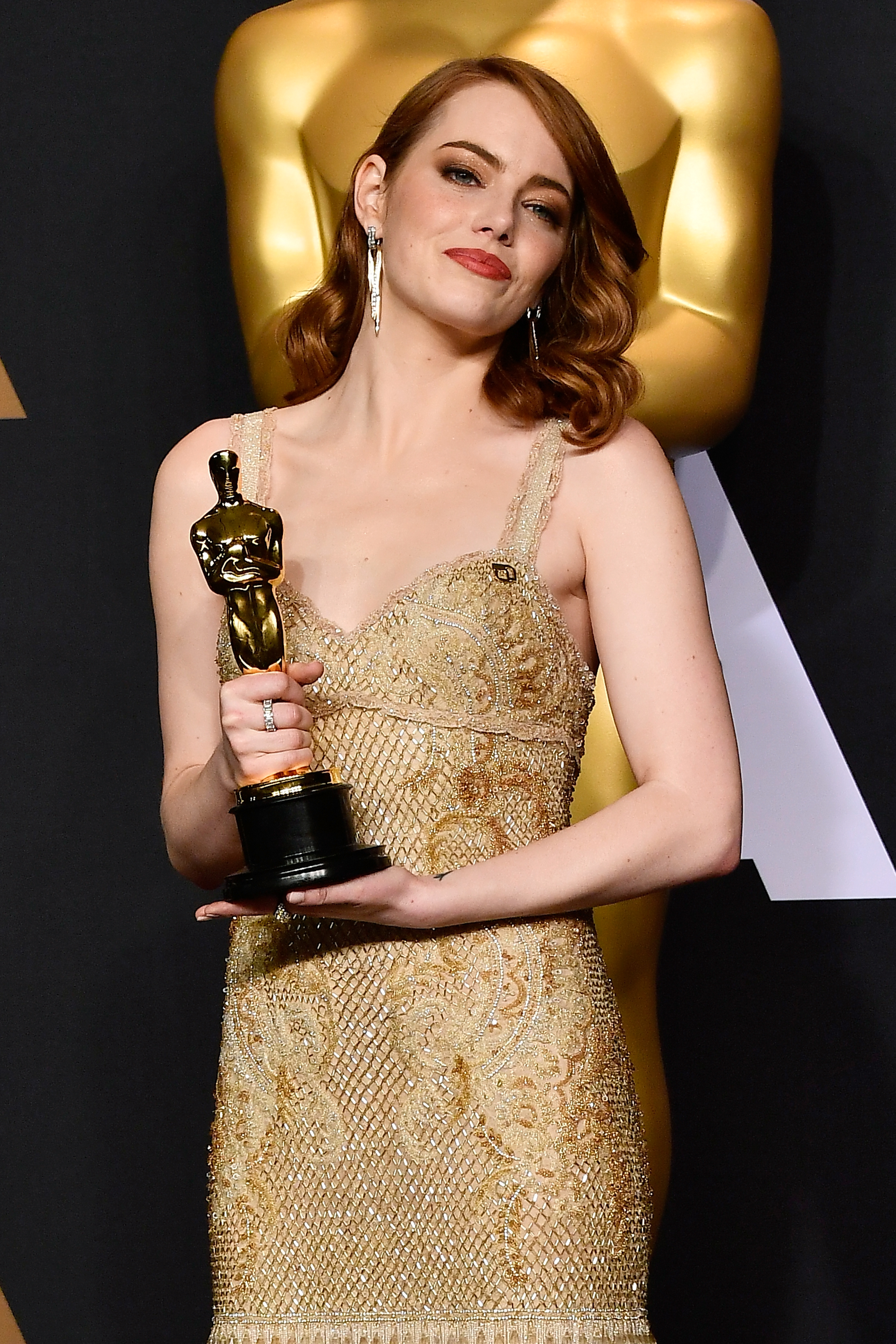 HOLLYWOOD, CA - FEBRUARY 26: Actress Emma Stone, winner of Best Actress for 'La La Land' poses in the press room during the 89th Annual Academy Awards at Hollywood & Highland Center on February 26, 2017 in Hollywood, California. Frazer Harrison/Getty Images/AFP