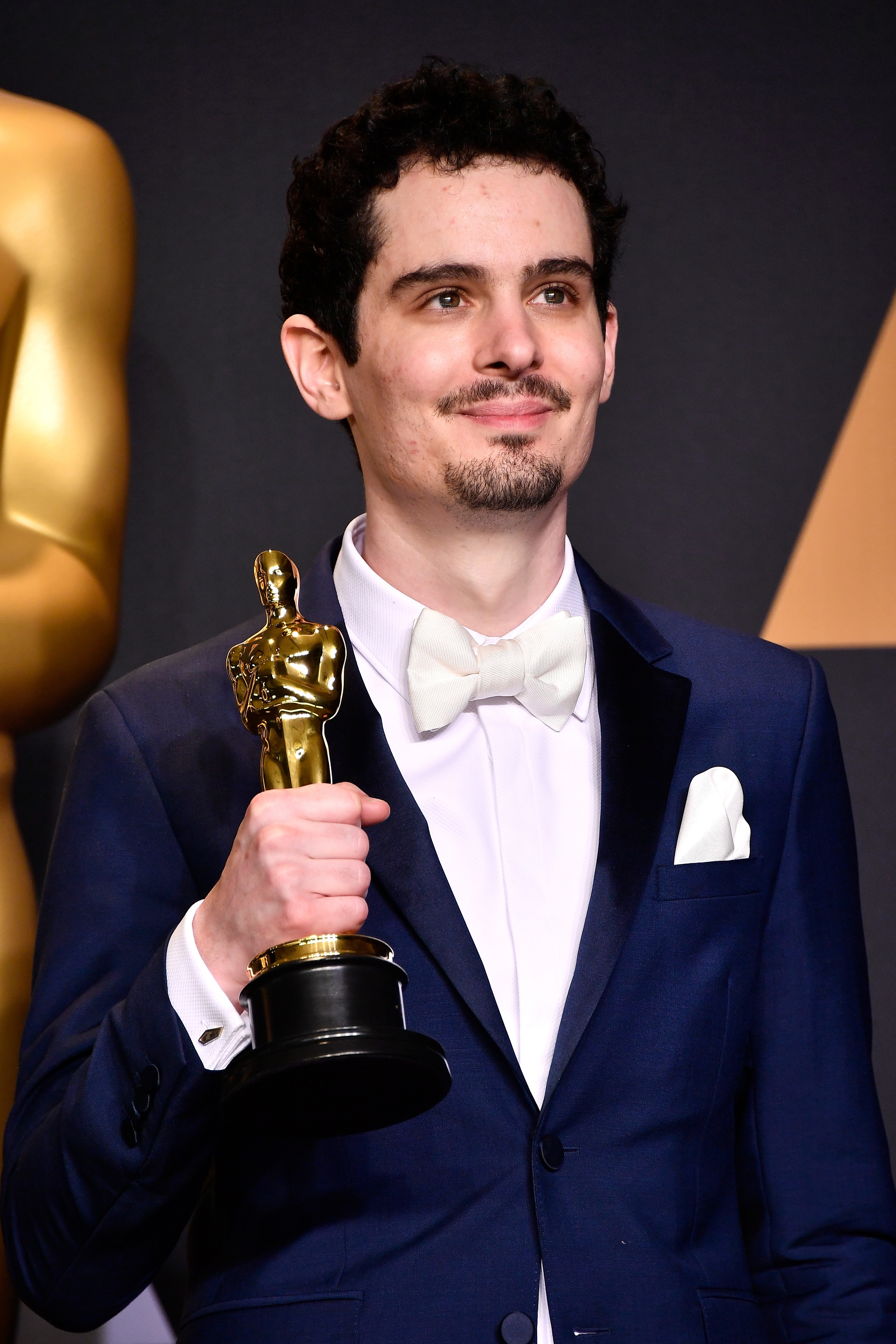 HOLLYWOOD, CA - FEBRUARY 26: Director Damien Chazelle, winner of Best Director for 'La La Land' poses in the press room during the 89th Annual Academy Awards at Hollywood & Highland Center on February 26, 2017 in Hollywood, California. Frazer Harrison/Getty Images/AFP