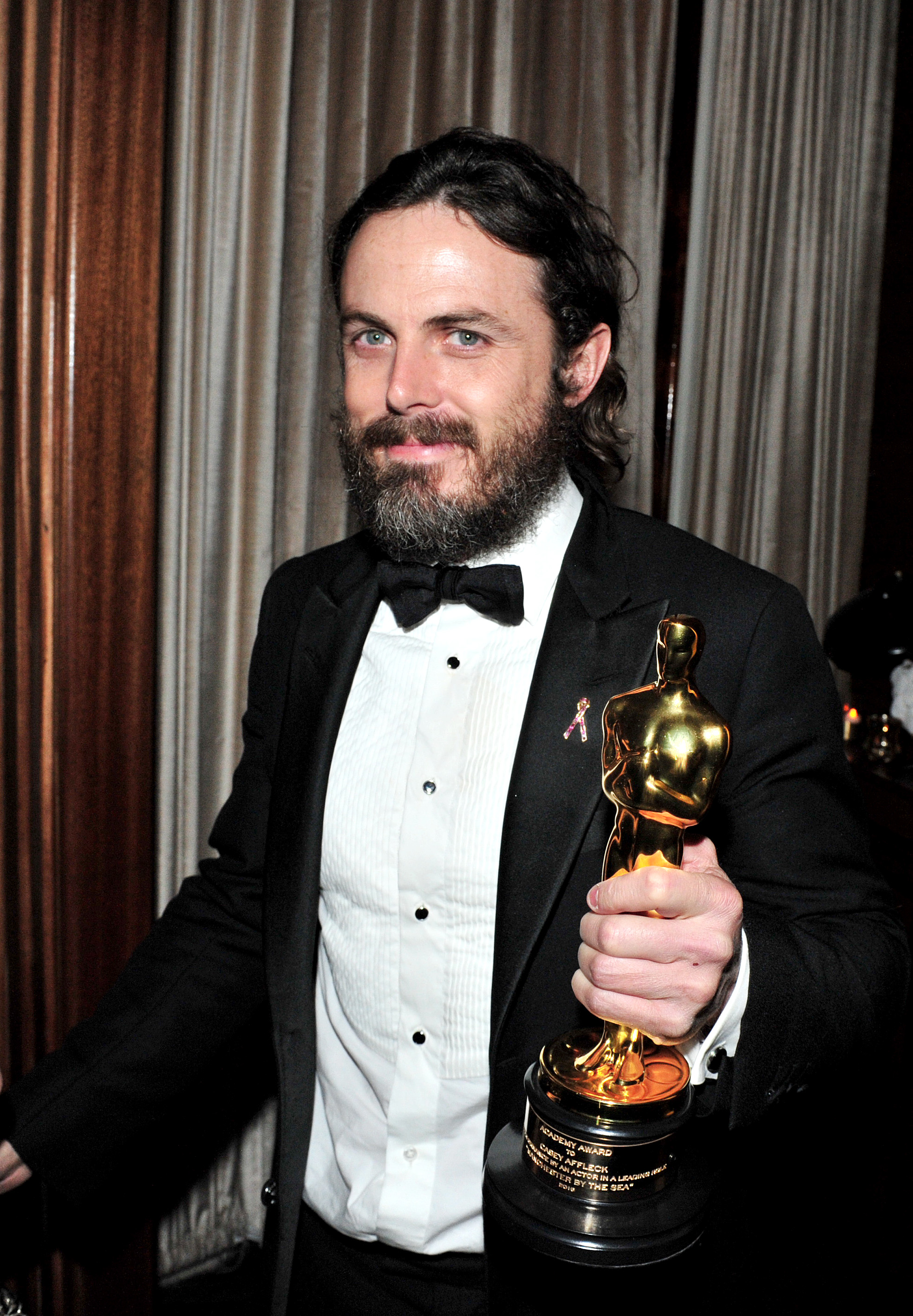 WEST HOLLYWOOD, CA - FEBRUARY 26: Actor Casey Affleck with his award for best actor in 'Manchester By The Sea' attends the Amazon Studios Oscar Celebration at Delilah on February 26, 2017 in West Hollywood, California. Jerod Harris/Getty Images/AFP